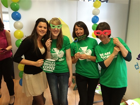 An image of some of the cancer info team wearing masks at the coffee morning