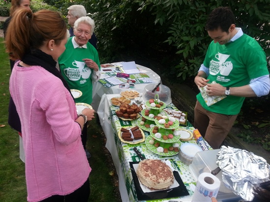 Photo showing people at a coffee morning in a garden in Knightsbridge