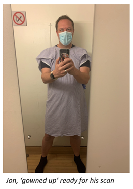 Jon, in a hospital gown