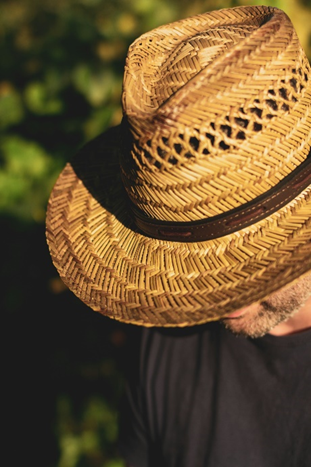  A person wearing a straw hat