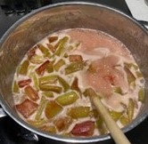 A photo of rhubarb in a pan, making jam