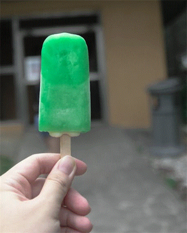  Green ice lolly on a stick