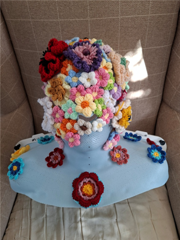 Radiotherapy mask with homemade flowers attached