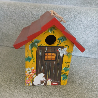 Hand painted red and yellow bird house
