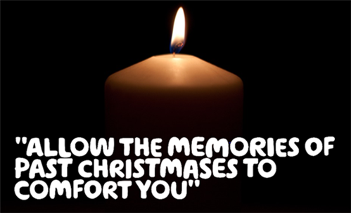 Allow the memory of past Christmasses comfort you, written in white over a black backgrouud with a lit candle in the middle. 