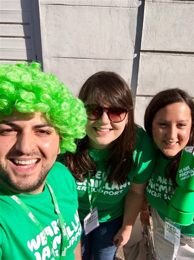 This photo shows editors Lauren, Sofiane and Sarah grinning at the camera while fundraising. 