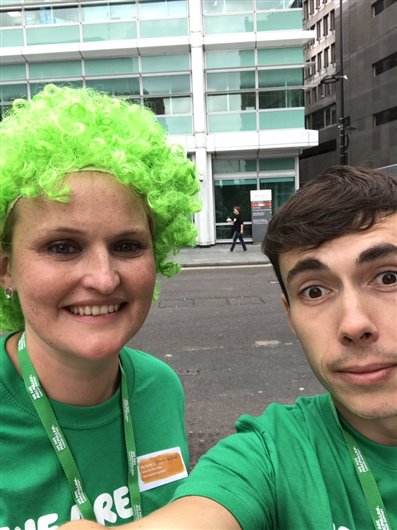 This photo shows Emma and Stu out and about on Warren Street - Emma is also wearing a bright green curly wig!