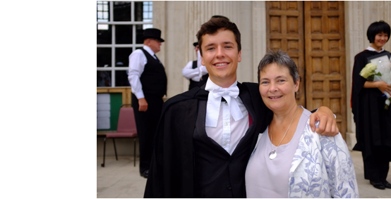 Benedict and his mum at his master’s graduation in 2018.