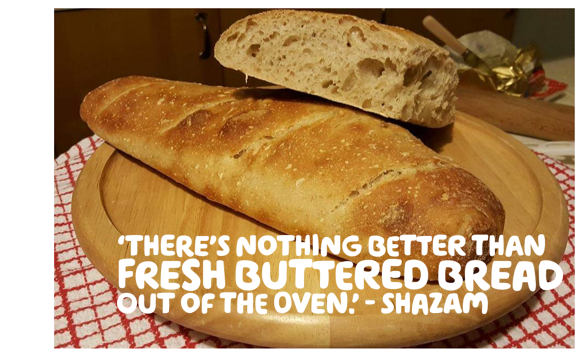  "There's nothing better than fresh buttered bread out of the oven."-Shazam written in white over a picture of bread on a red and white table cloth 