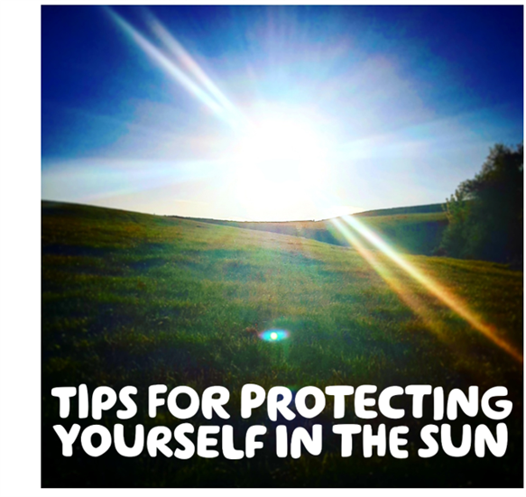  The words 'Tips for protecting yourself in the sun' written in white on a picture of a bright sun in a blue sky and green grass