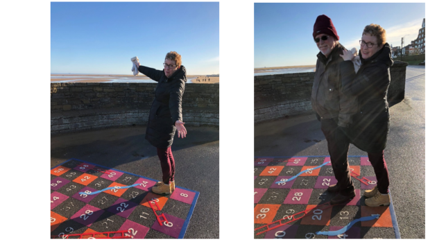  Two pictures of Lindsay with a snakes and ladders board on the pavement, with the beach in the background. 