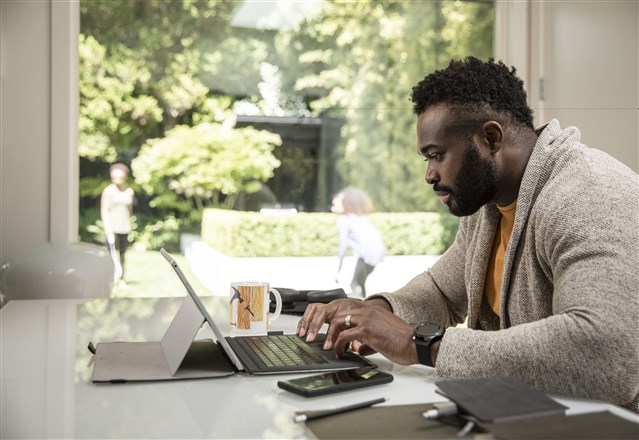 Man sat with laptop