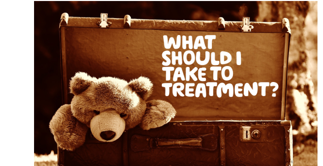 "What should I take to treatment?' written over a picture of a brown suitcase with a teddy.