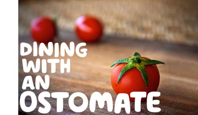  "Dining with an ostomate" written in white over an image of a tomato on a wooden board
