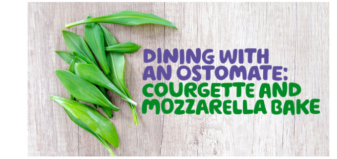  "Dining with an ostomate: Courgette and mozzarella bake" written on a picture of a wooden countertop, with basil leaves