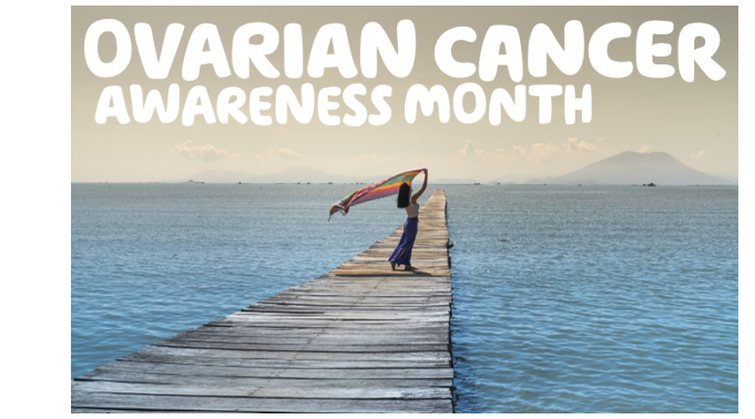  "Ovarian cancer awareness month" written over a picture of a woman on a pier with a flowing skirt and scarf, 
