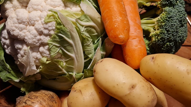 A close up image of fresh whole vegetables